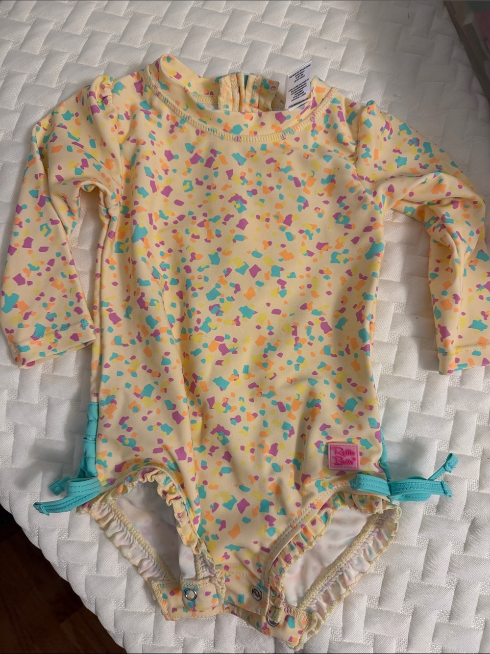 Ruffle Butts Yellow Confetti Long-Sleeve One-Piece with Teal & Pink Accents